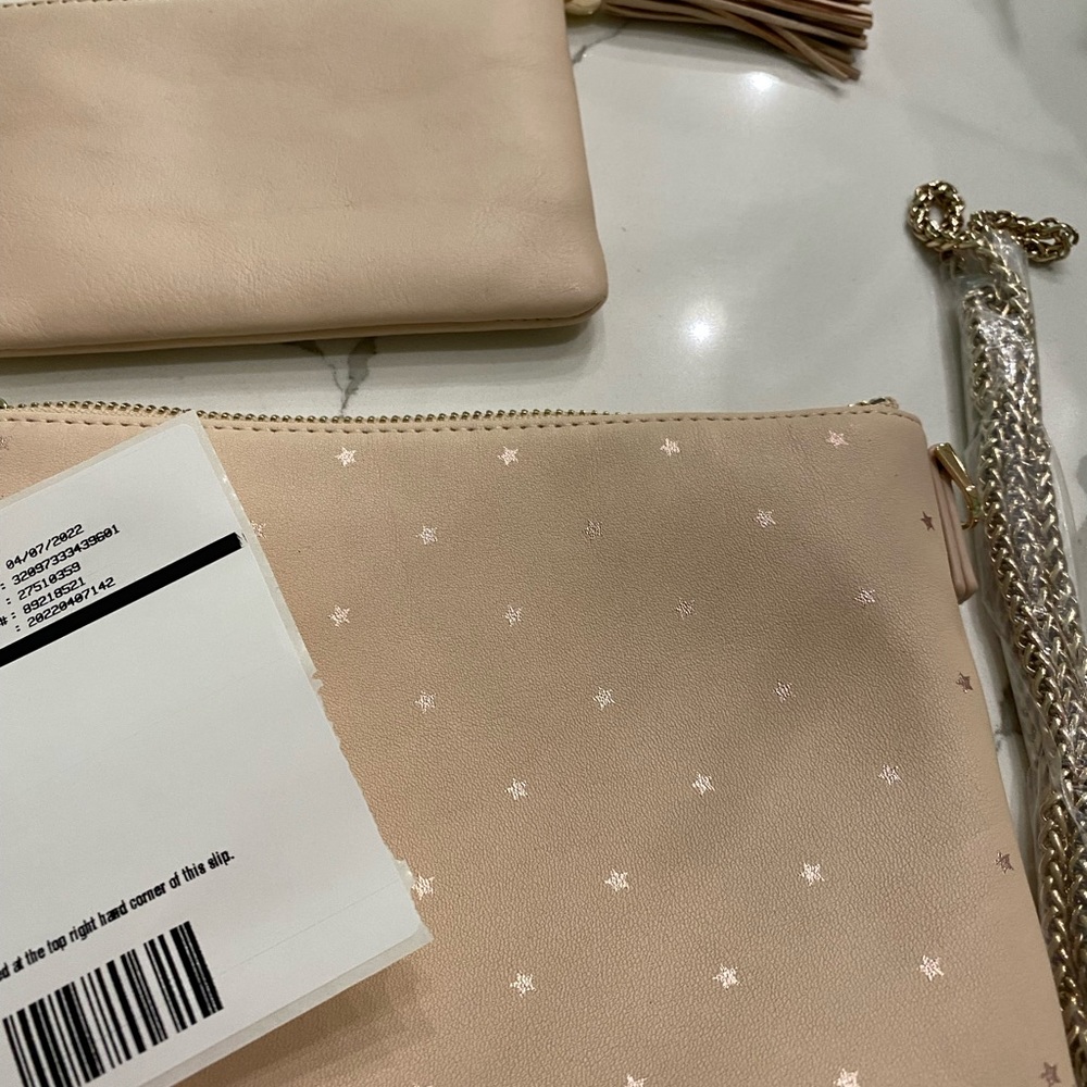 Mark and Graham LEATHER tassel cb w foil stars and leather zipper pouch NWT
